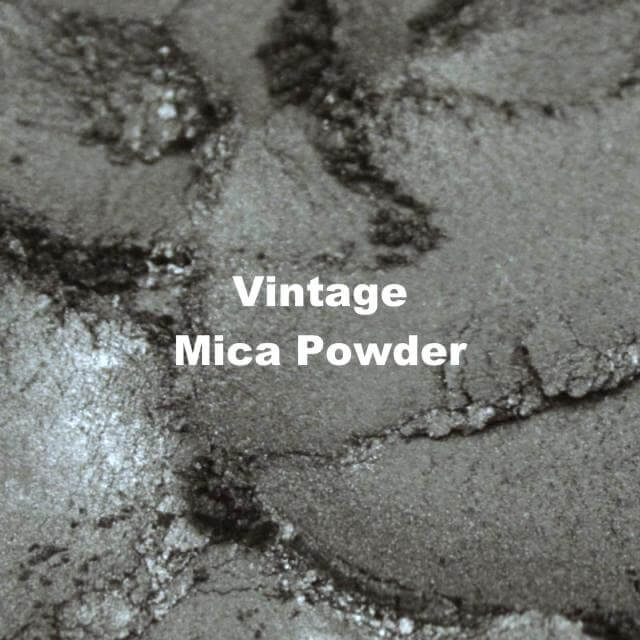 Vintage Mica Powder in shimmering gray for DIY projects like soap and epoxy resin. Ideal pigment for creative uses.